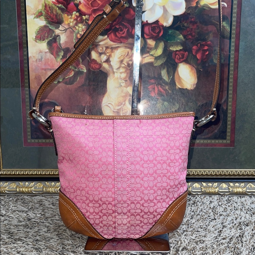 Coach Soho signature mini swingpack bag in pink canvas with brown leather trim